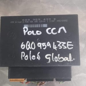 Front view of a VW Polo control module showing wiring harness and connector ports.Front view of a VW Polo cont