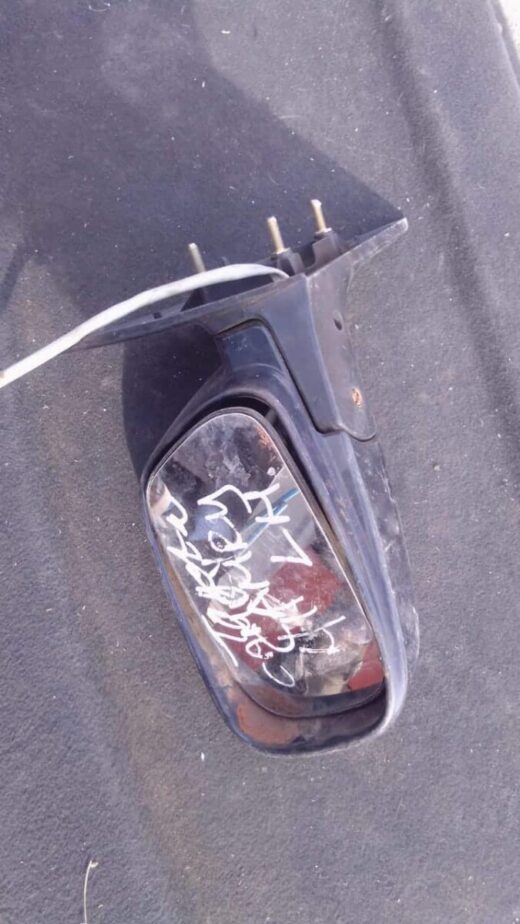 Used left side mirror for 1996 Toyota Camry, shown from a slight side angle on a white background.Used left si